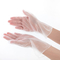 Los guantes protectores disponibles transparentes del PVC pulverizan el vinilo libre